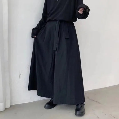 Kón black hakama pants – A-line silhouette – full length side view