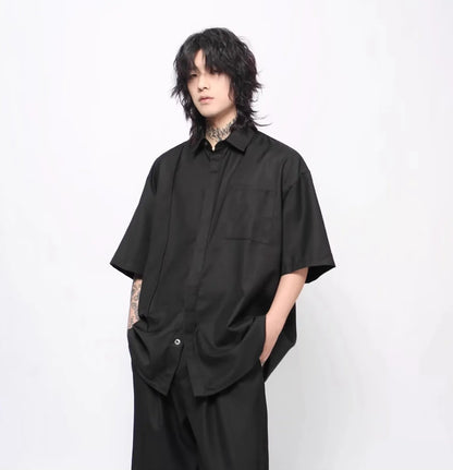 Kón oversized dropped shoulder shirt – hidden placket – front three-quarter view