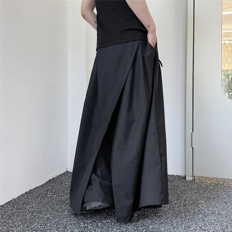 Split front hakama pants in motion – avant-garde Japanese fashion – side view