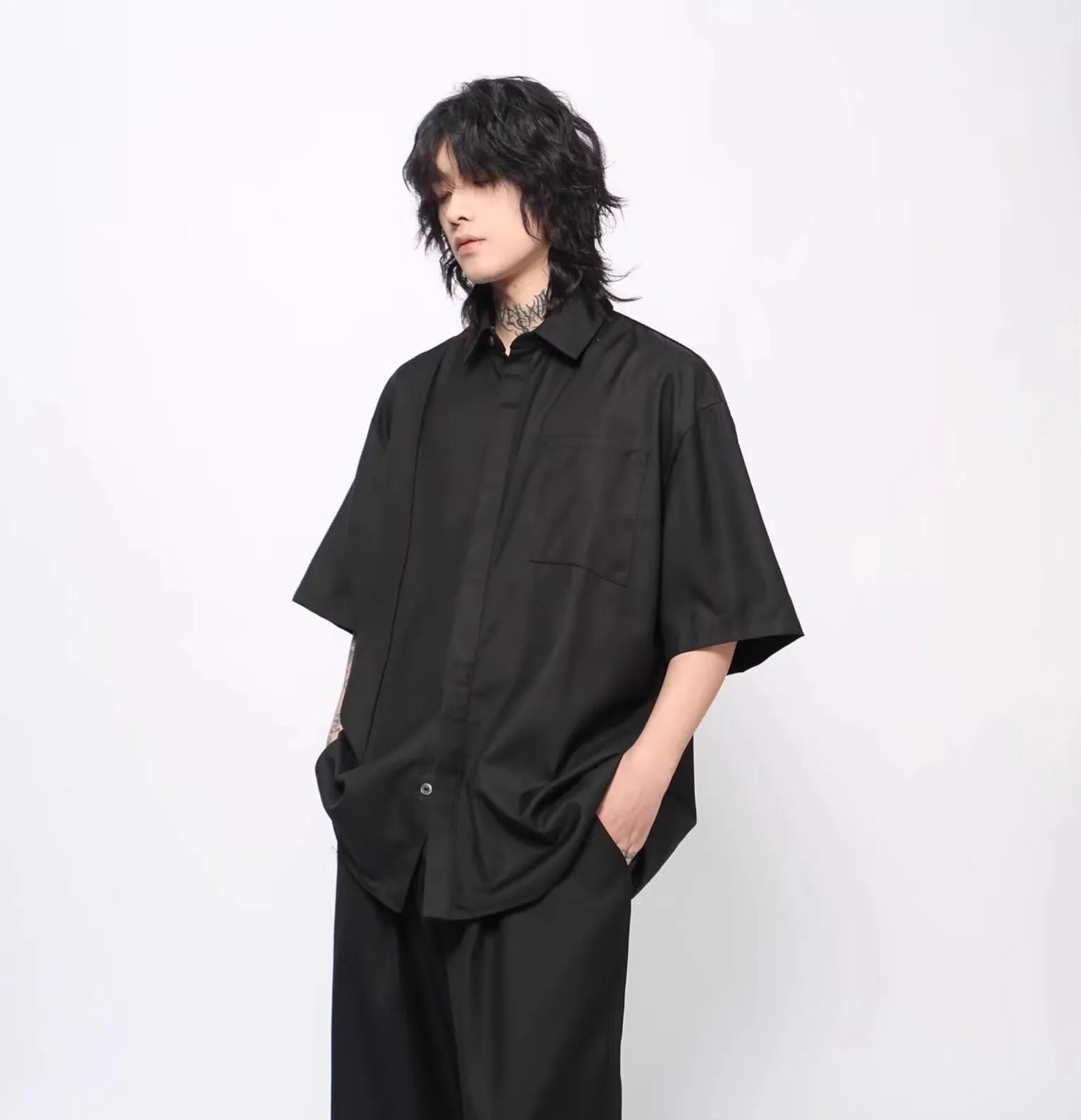 Dark avant-garde unisex shirt – dropped shoulder construction – side view