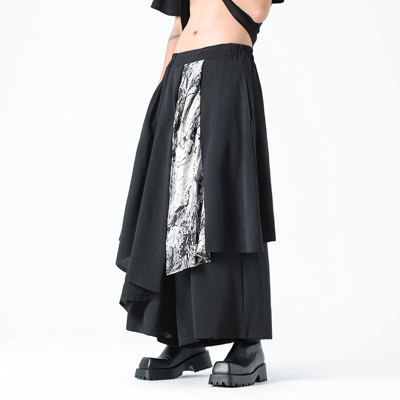 Kón layered hakama pants – asymmetric ink-print panel detail – side view