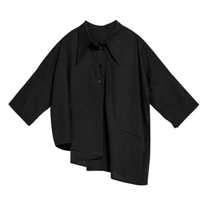 Asymmetric avant-garde shirt in black – oversized unisex – flat lay